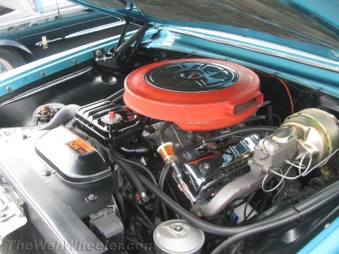1968 Ford Mustang - Photograph of a classic Ford engine bay with a large red air cleaner.