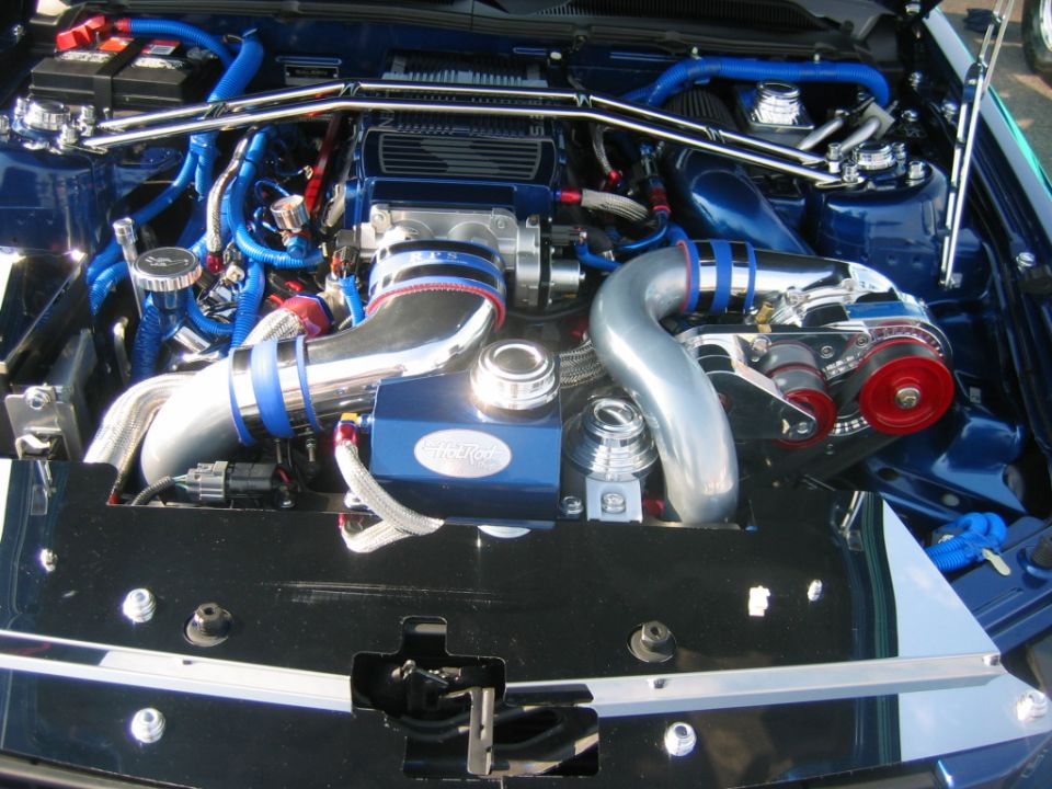 car interior with blue seats and dashboard details