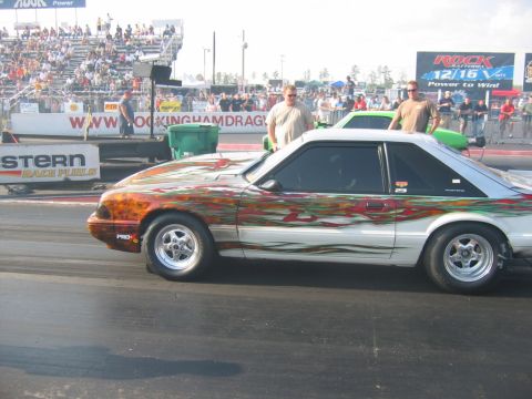 1992 Ford Mustang - A custom-painted Ford Mustang sits on the drag strip, ready for action.