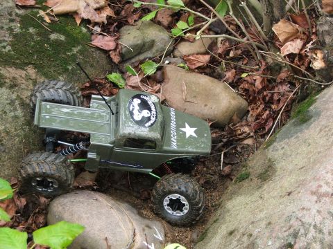 1996 Ford Bronco - This RC rock crawler has VARCOffroaders text and a star graphic on its hood.