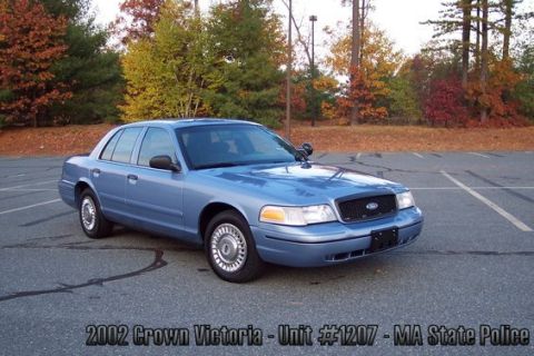2001 Ford Crown Victoria - 2002 Ford Crown Victoria, Unit #1207, MA State Police, parked outdoors with fall foliage.