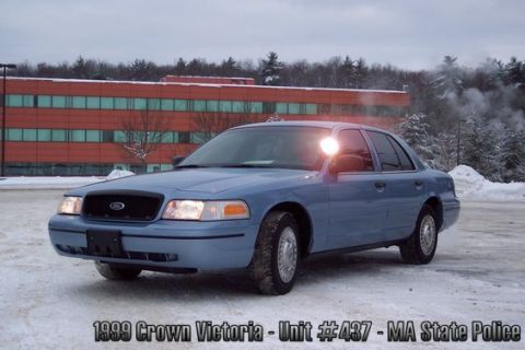 2001 Ford Crown Victoria - 1999 Ford Crown Victoria, Unit #437, MA State Police, parked in a snowy lot.