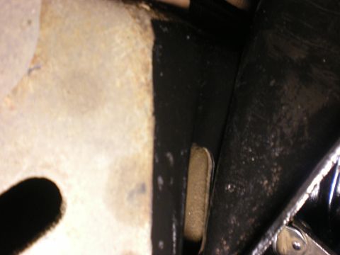 1993 Ford Bronco - Detail shot of vehicle frame and suspension components, potentially from a Ford Bronco.