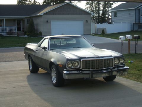 1974 Ford Ranchero - This 1974 Ford Ranchero is parked in a suburban driveway with a house and garage in the background.