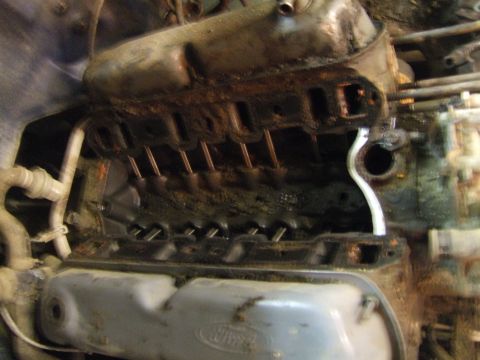 1989 Ford Bronco - Close-up of a Ford V8 engine during maintenance, intake manifold removed.