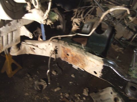 1989 Ford Bronco - This image shows a section of a vehicle's frame and engine components, not a complete vehicle.