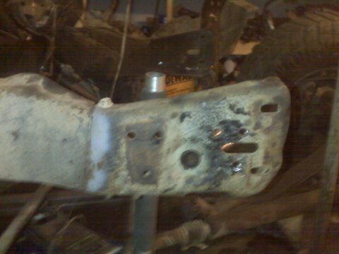 1989 Ford Bronco - This image shows a close-up of a vehicle's frame, likely undergoing modification or repair.