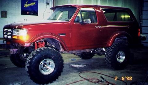 1981 Ford Bronco - This lifted Ford Bronco features large off-road tires and custom wheels.