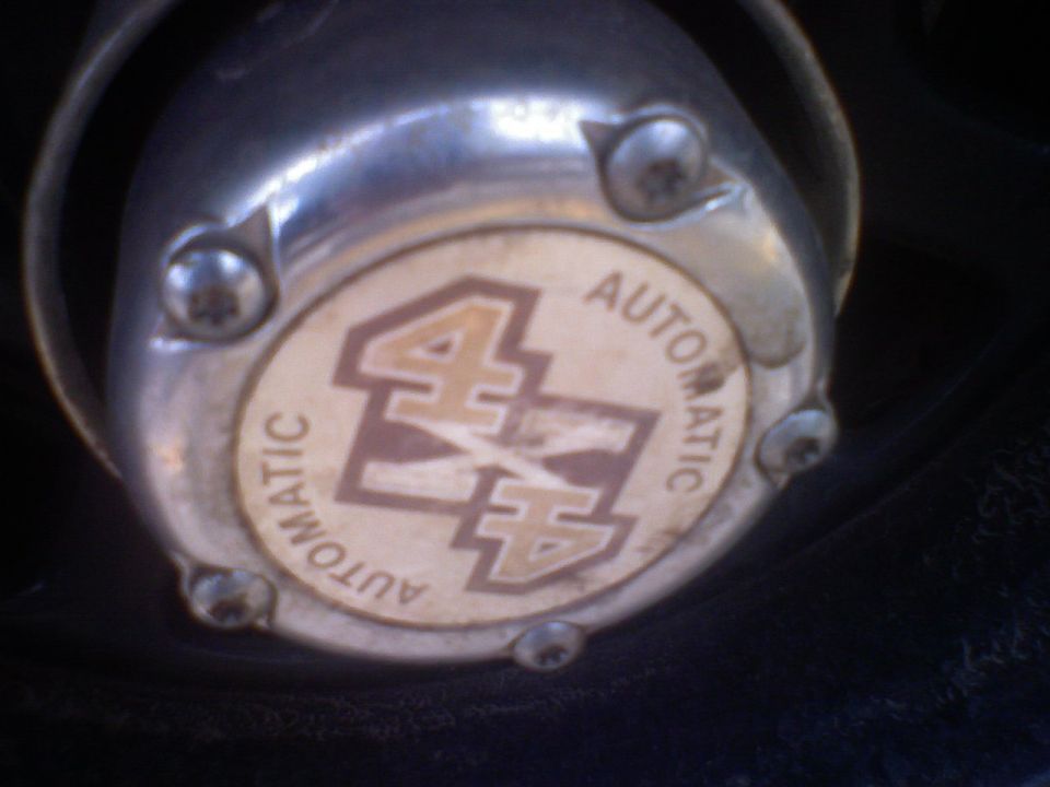 Close-up of an automatic 4x4 hubcap.
