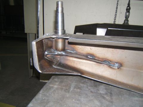 1993 Ford Bronco - A close-up view of a chrome rear bumper section, showing some text.