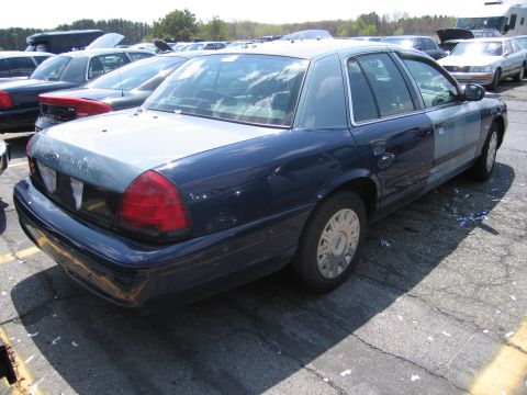 2001 Ford Crown Victoria - This Ford Crown Victoria has a two-tone paint scheme, with a dark blue lower body and a light blue upper body and roof.