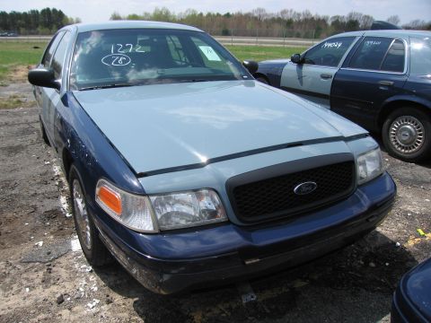 2001 Ford Crown Victoria - Front view of a 2001 Ford Crown Victoria with a two-tone paint scheme.