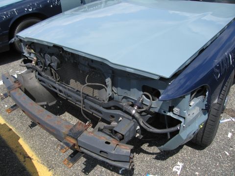 2001 Ford Crown Victoria - Photograph of a car front end, not a technical document.
