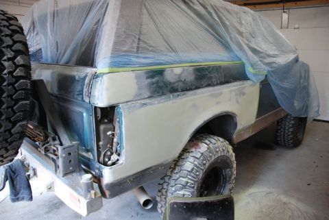 1996 Ford Bronco - Photograph of a vehicle body undergoing bodywork and masking, not a technical document.
