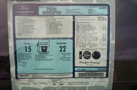 2001 Ford Crown Victoria - Factory window sticker (Monroney label) showing standard/optional equipment and MSRP for a Crown Victoria Police Interceptor.