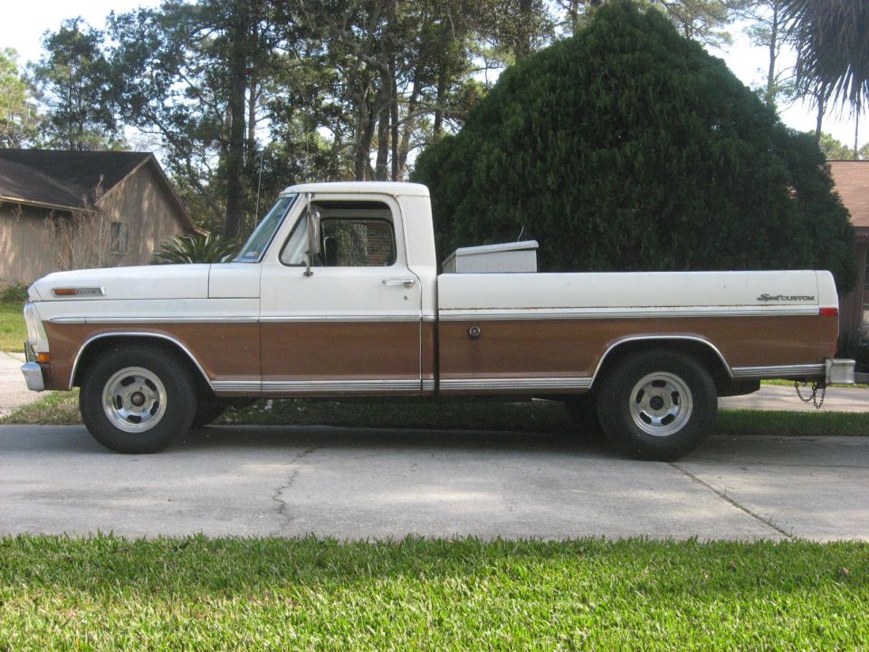 1972 Ford F-100 pickup truck, side view, white and brown exterior