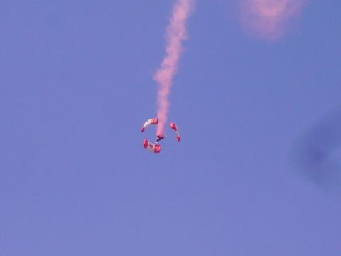 1990 Ford Bronco - A pink object is seen against a clear blue sky.