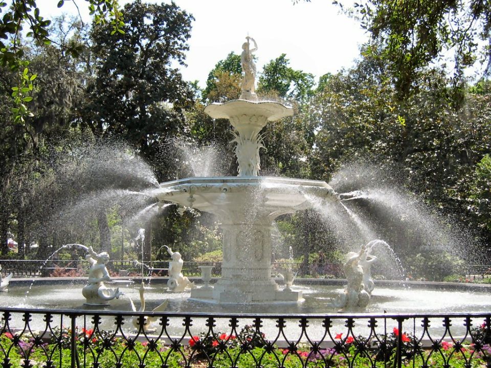 Fountain with water spraying in a park setting