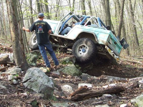 1969 Ford Bronco - This 1969 Ford Bronco navigates a challenging rocky trail during an off-road event.