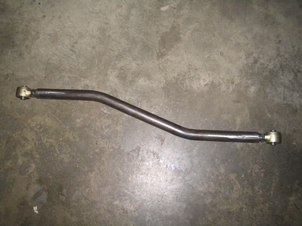 Metal rod with threaded ends and spherical joints