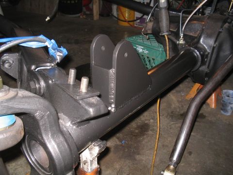 1979 Ford Bronco - Custom suspension fabrication on a vehicle axle, possibly for a 1-ton swap project.