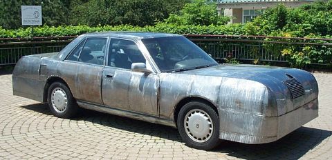 2001 Ford Crown Victoria - This custom sedan features a unique body constructed entirely from riveted metal panels.