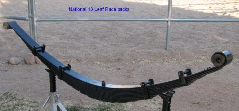 2008 Ford Bronco - A black leaf spring is displayed on a stand, with text indicating it is for racing parts.