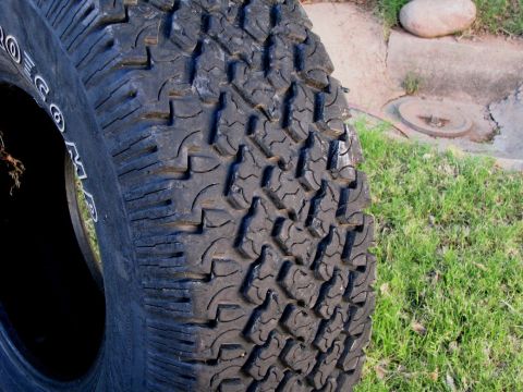 2008 Ford Bronco - Close-up of a tire with aggressive tread pattern.