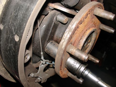 1978 Ford Bronco - Removing rear axles. Four retainer nut.