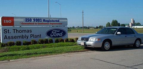2001 Ford Crown Victoria - Silver 2001 Ford Crown Victoria parked next to the St. Thomas Assembly Plant sign.