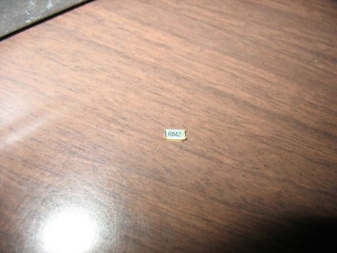 1995 Ford C-350 (Centurion Conversions) - A small label with the number 6042 is visible on a wooden surface.