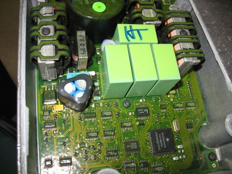 1995 Ford C-350 (Centurion Conversions) - Close-up of an electronic control unit's circuit board, showing various components and circuitry.
