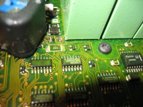 1995 Ford C-350 (Centurion Conversions) - A detailed view of electronic components and circuitry on a green printed circuit board.