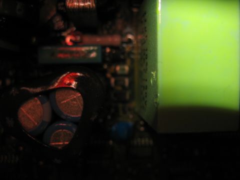 1995 Ford C-350 (Centurion Conversions) - A detailed view of electronic components, highlighting capacitors and a circuit board with intricate wiring.