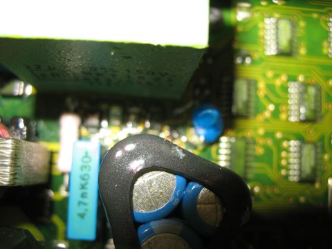 1995 Ford C-350 (Centurion Conversions) - A detailed view of electronic components, capacitors and a green circuit board with visible traces.