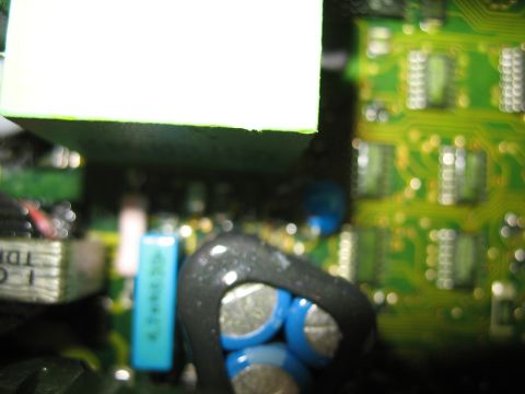 1995 Ford C-350 (Centurion Conversions) - Close-up of electronic components on a circuit board, including capacitors and integrated circuits.