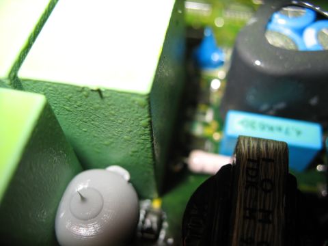 1995 Ford C-350 (Centurion Conversions) - A detailed view of various electronic components on a circuit board, capacitors and other parts.