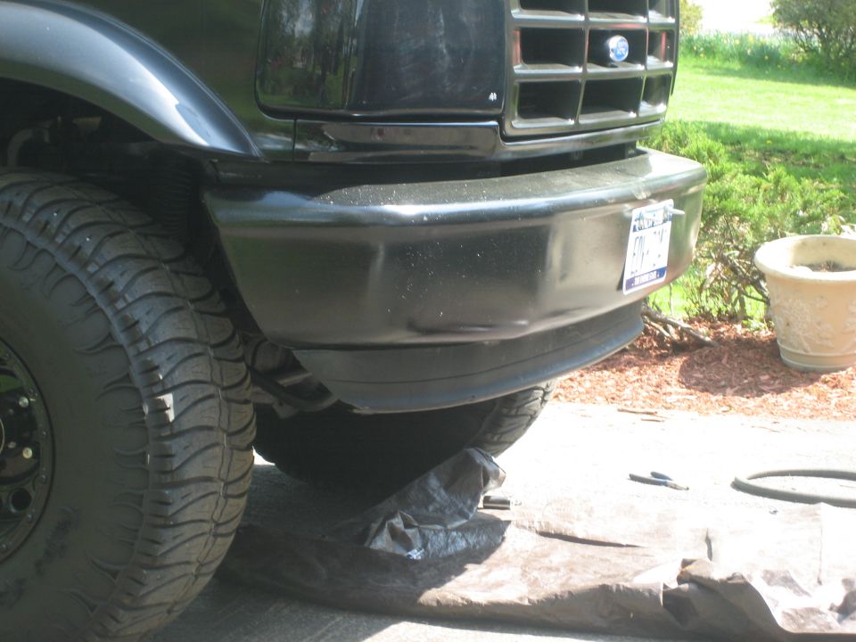 Black Ford Bronco front bumper with license plate and tire visible