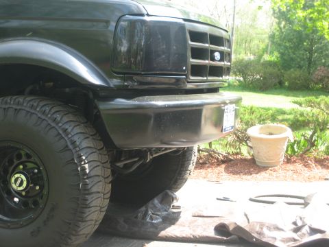 1995 Ford Bronco - Front view of a 1995 Ford Bronco, showing the grille and bumper details.
