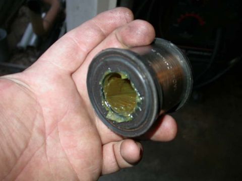 1990 Ford Bronco - Outer axle tube seal packed with grease and ready to install. You just pack them with grease, put some RTV on the outside of them and press…