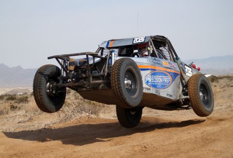 2008 Ford Bronco - This off-road buggy, marked with number 2025, is captured mid-air during a race.