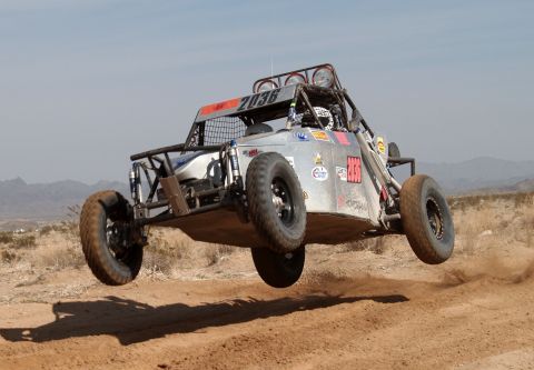 2008 Ford Bronco - This off-road buggy is captured mid-air during a race, with the number 2036 clearly displayed on its roof.