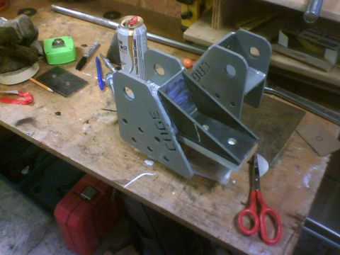 1993 Ford Bronco - Custom metal fabrication part with stamped markings, likely for off-road vehicle modification.
