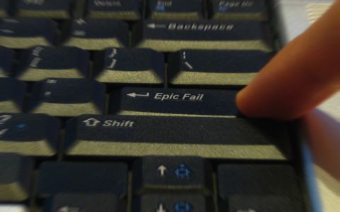 1989 Ford Probe - A finger hovers over the 'Epic Fail' key on a keyboard, suggesting a humorous or unfortunate outcome.