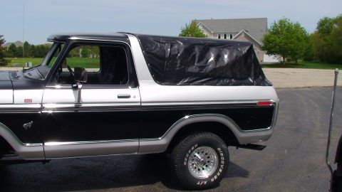 1979 Ford Bronco - This two-tone Ford Bronco has a black soft top and appears to be from the late 1970s.