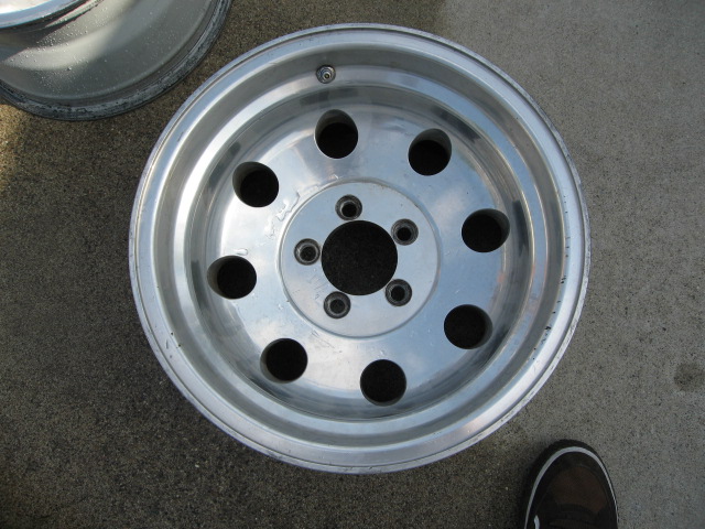 Aluminum alloy wheel with 5 lug holes and 10 circular cutouts
