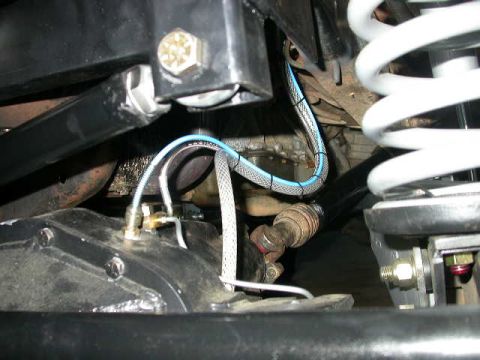 1990 Ford Bronco - The axles umbilical cord with the vent tube, ARB air line, and center drop brake line.