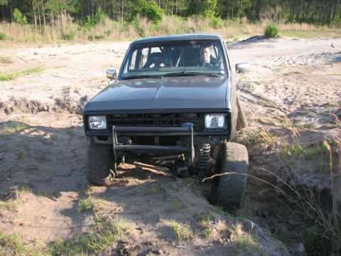 1984 Ford Bronco II - 1984 Ford Bronco II navigating an off-road course.
