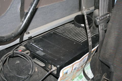2003 Jeep TJ - Close-up of a Motorola radio installed inside a vehicle's cabin.
