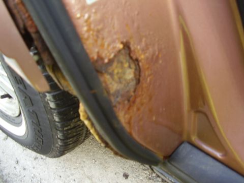 1996 Ford F-150 - Significant rust is visible on the door frame of this vehicle, obscuring any specific year identification.